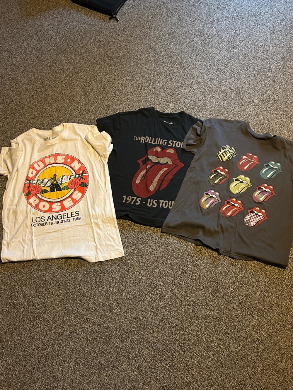 3 total shirts- 2 Rolling Stones and 1 -Guns and Roses Graphic Tees